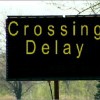 delay crossing sign